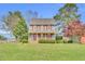 Charming two-story home featuring blue siding, red shutters and a cozy front porch at 3808 Johnson Pond Rd, Apex, NC 27539