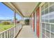 Inviting front porch with white railing and views of the expansive front yard at 3808 Johnson Pond Rd, Apex, NC 27539