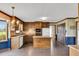 Traditional kitchen with wood cabinets, a central island, and a dining nook with bay window at 3808 Johnson Pond Rd, Apex, NC 27539