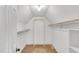 Spacious walk-in closet with carpet flooring, white paint and shelving for storage at 3808 Johnson Pond Rd, Apex, NC 27539
