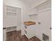 Convenient mudroom with custom built-ins, cubbies, and wood countertop, perfect for organization at 390 Pilot Ridge Rd, Zebulon, NC 27597