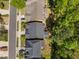 Aerial view highlighting the backyard landscapes, mature trees, and home rooftops at 4121 Enfield Ridge Dr, Cary, NC 27519