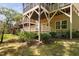 Exterior view of home showing backyard, patios, and lush landscaping at 4121 Enfield Ridge Dr, Cary, NC 27519