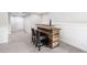 Basement features a rustic wood bar with barstool seating and carpet at 4121 Enfield Ridge Dr, Cary, NC 27519