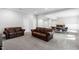 Expansive basement offers living area, game table, and bar area for entertaining guests at 4121 Enfield Ridge Dr, Cary, NC 27519