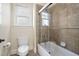 Bathroom showing the toilet and shower/tub and the window for natural light at 4121 Enfield Ridge Dr, Cary, NC 27519