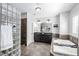 Luxurious bathroom with a double vanity, glass block shower, and a large soaking tub at 4121 Enfield Ridge Dr, Cary, NC 27519