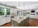 Spacious kitchen featuring a large island, granite countertops, and an open layout at 4121 Enfield Ridge Dr, Cary, NC 27519