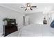 Comfortable primary bedroom with neutral walls and a view of the ensuite bathroom at 4121 Enfield Ridge Dr, Cary, NC 27519