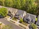 Aerial view of attractive street lined with lovely homes, mature trees, and manicured lawns at 4121 Enfield Ridge Dr, Cary, NC 27519