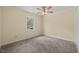 Neutral bedroom featuring a window, and plush carpeting at 4508 Fox Rd, Raleigh, NC 27616