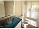 The hall bathroom has a tub and shower combination and a standard vanity at 47 Silver Ct, Smithfield, NC 27577
