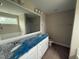 A bright main bathroom featuring double sinks, granite countertops, and a shower at 47 Silver Ct, Smithfield, NC 27577