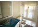 Bathroom with a vanity and shower-tub combo at 47 Silver Ct, Smithfield, NC 27577