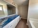 Spacious bathroom featuring double sinks, a soaking tub, and sleek finishes at 47 Silver Ct, Smithfield, NC 27577