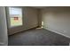 A simple bedroom with carpet and a window, providing natural light at 47 Silver Ct, Smithfield, NC 27577