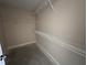 Walk-in closet featuring wire shelving for storage and organization at 47 Silver Ct, Smithfield, NC 27577