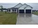 Charming single-story home with a two-car garage, covered porch, and well-manicured lawn at 47 Silver Ct, Smithfield, NC 27577