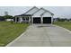 Charming new construction home with a spacious driveway and a two-car garage at 47 Silver Ct, Smithfield, NC 27577