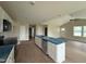 Open kitchen featuring an island with bar seating and stainless steel appliances at 47 Silver Ct, Smithfield, NC 27577