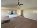A spacious and bright living room open to kitchen with modern flooring at 47 Silver Ct, Smithfield, NC 27577