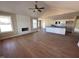 Spacious living room featuring hard wood flooring and a fireplace, perfect for relaxation at 47 Silver Ct, Smithfield, NC 27577