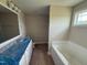 The main bathroom is furnished with a vanity, tub and walk-in shower at 47 Silver Ct, Smithfield, NC 27577