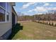 Large backyard featuring fresh sod and green space at 48 Tanseyleaf Dr, Smithfield, NC 27577