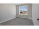 Bright bedroom features neutral paint, soft carpet and window with an outside view at 48 Tanseyleaf Dr, Smithfield, NC 27577