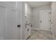 A conveniently located laundry room with modern fixtures and ample storage space at 48 Tanseyleaf Dr, Smithfield, NC 27577