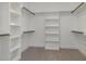 A well-organized walk-in closet with shelving and hanging space at 48 Tanseyleaf Dr, Smithfield, NC 27577