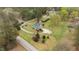 Expansive aerial view of a charming home nestled on a spacious, wooded lot at 4810 Mitchell Mill Rd, Wake Forest, NC 27587