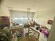 Spacious garage area provides parking and storage; lots of storage boxes are visible at 50 Teal Dr, Youngsville, NC 27596