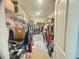 Walk-in closet with lots of hanging clothes and plenty of storage at 50 Teal Dr, Youngsville, NC 27596