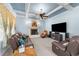 Inviting living room features a fireplace, coffered ceiling, and comfortable seating at 5317 Serather Ct, Garner, NC 27529