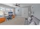 Bright office space with large windows, a desk, and comfortable seating at 5317 Serather Ct, Garner, NC 27529