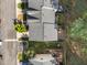 An aerial view shows the back patios, fencing and the surrounding neighborhood layout at 5430 Crabtree Park Ct, Raleigh, NC 27612