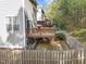 Multi-level deck overlooking a fenced yard at 5430 Crabtree Park Ct, Raleigh, NC 27612