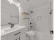Bathroom features a sleek vanity, tub and shower with modern fixtures at 5430 Crabtree Park Ct, Raleigh, NC 27612