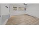 Bedroom with a ceiling fan, hardwood floors, and a closet at 5430 Crabtree Park Ct, Raleigh, NC 27612