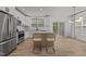 Beautiful kitchen featuring granite countertops, stainless steel appliances, and an island with seating at 5430 Crabtree Park Ct, Raleigh, NC 27612