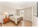 Relaxing bedroom with wood floors, wooden furniture, and a comfortable bed at 5570 Normans Rd, Rougemont, NC 27572