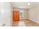 Spare bedroom with a cedar armoire, bright natural light, and wood-look floors at 5570 Normans Rd, Rougemont, NC 27572
