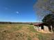 Remote outbuilding in a large grassy field, perfect for storage or workshop with lots of open space at 5570 Normans Rd, Rougemont, NC 27572