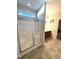 Ensuite bathroom features stand up shower and single sink vanity at 6320 Slopeside Ct, Raleigh, NC 27610