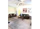 Spacious living room with neutral carpet, two sofas, ceiling fan and ample natural light at 6320 Slopeside Ct, Raleigh, NC 27610
