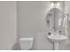 Stylish powder room features modern fixtures and a clean, minimalist design at 706 Fireball Ct, Knightdale, NC 27545