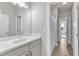 Bright bathroom with white vanity and tile flooring at 706 Fireball Ct, Knightdale, NC 27545
