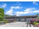 YMCA with well-maintained landscaping, benches, and bike racks on a sunny day at 706 Fireball Ct, Knightdale, NC 27545