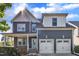 Charming two-story home featuring a two-car garage, covered porch, and professionally landscaped front yard at 706 Fireball Ct, Knightdale, NC 27545
